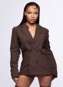 Beatriz thumbnail - elite Latin escort London in a pinstripe blazer dress