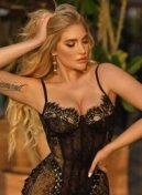 Nataly thumbnail - elite escort London in a black lace corset