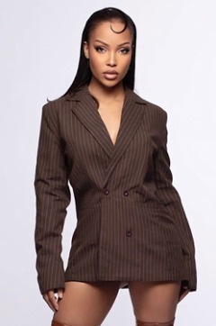 Beatriz thumbnail - elite Latin escort London in a pinstripe blazer dress