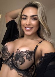 Karli thumbnail - busty Latin escort London in a black floral lace bra
